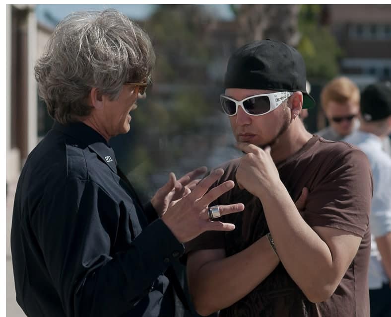 Riz Story and Eric Roberts