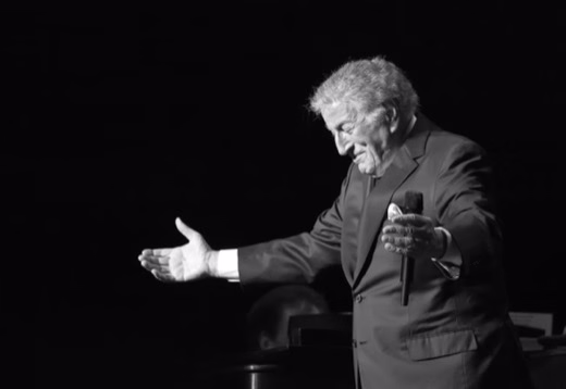 Tony Bennett performing on stage at the State Theater in 2016