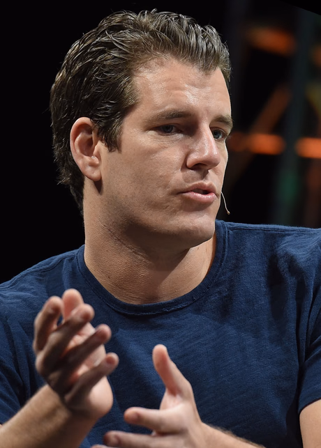 Tyler Winklevoss speaking onstage at TechCrunch Disrupt NY in 2015